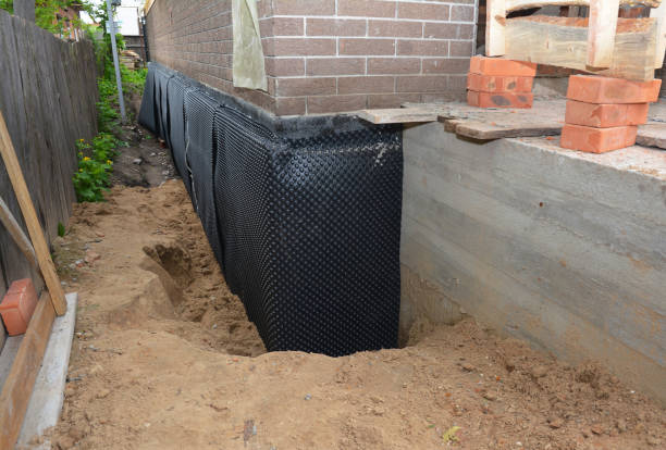 SJ Waterproofing Pros technician performing targeted Sump Pump Installation assessment in Olivet, TN